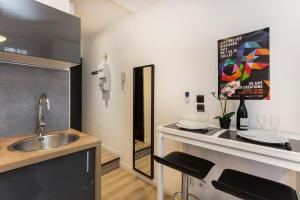 Appartements Studio Serenita : photos des chambres