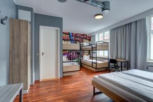 Bed in 6-Bed Mixed Dormitory Room room in Urban House Copenhagen by MEININGER