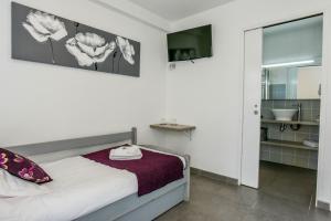 Hotels Logis Hotel Emeraude des Bois : photos des chambres