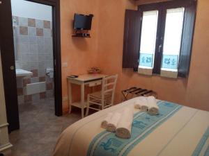 Camera Matrimoniale/Doppia con Letti Singoli con Bagno Privato