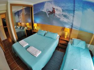 Triple Room with Shared Toilet room in Supertubos Beach Hostel