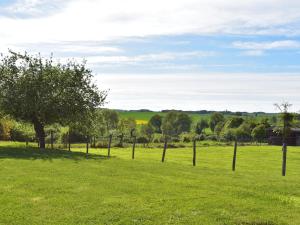 Maisons de vacances Holiday home with garden : photos des chambres