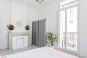 Appartements Sunny Relaxing Apartement : photos des chambres