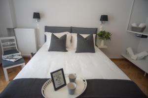 Living near Acropolis by Sylvia Staikou 2nd & 3d floor