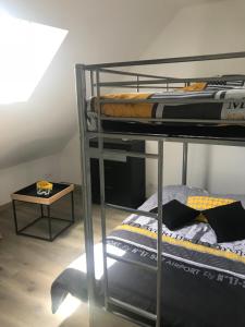 Maisons de vacances Gite 5 pers avec 2h espace bien-etre privatise inclus dans le prix de la nuit 80m2 de detente : photos des chambres