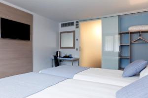 Hotels Kyriad Lyon Sud Sainte Foy : photos des chambres