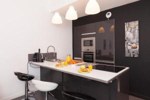 Appartements Manhattan 2 pieces 3 etoiles lumineux plein centre a 5mn des plages et palais : photos des chambres