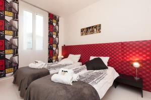 Appartements Manhattan 2 pieces 3 etoiles lumineux plein centre a 5mn des plages et palais : photos des chambres