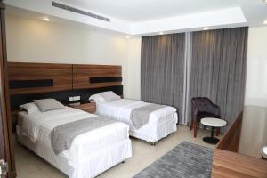 شقق الأجنحة المخملية للشقق المخدومة اقتصادي - السلامة