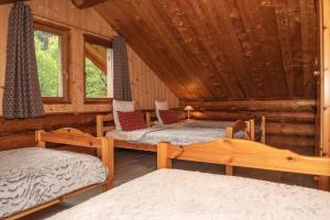 Appart'hotels Le Couaroge Chalets et Appartements : photos des chambres