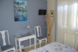 B&B / Chambres d'hotes a2pasdelaforet : photos des chambres