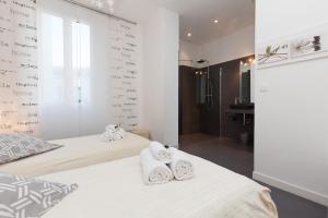 Appartements Nature 2 pieces 3 etoiles calme plein centre cannes 5 mn des plages et Palais : photos des chambres