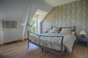 Fermes Au Jardin Fleuri : photos des chambres