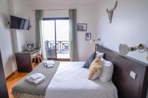Hotels Single Fin Hotel & Lodge : Chambre Double avec Balcon