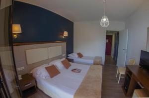 Hotels Les Flots Bleus : photos des chambres