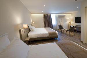 Hotels La Sorelle Hotel Golf et Restaurant : Suite Junior - Vue sur Jardin