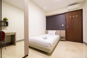 Modern Elegant Design 2BR LAvenue Apartment By Travelio