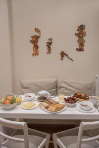 Living near Acropolis by Sylvia Staikou 2nd & 3d floor