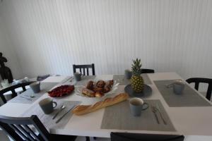 Appartements Entre douceur et delicatesse : photos des chambres