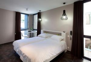 Hotels Urban Style LES FLEURINES : photos des chambres