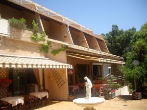 Hôtel Les Palmiers photo 6