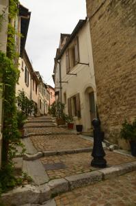 Appartements Aux pieds des arenes : photos des chambres