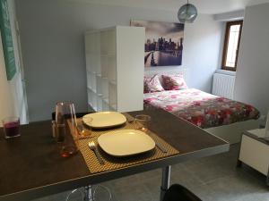 Appartements Le cocon des Monts d'Or : photos des chambres