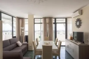 Attico Saker - راكالي