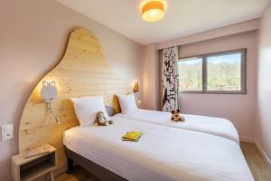 Complexes hoteliers Center Parcs Villages Nature Paris : photos des chambres