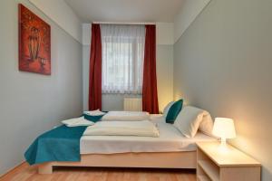 Two-Bedroom Apartment with Balcony room in Agape Apartments