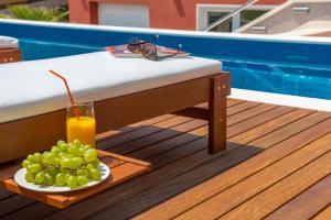 Villa Arya with heated swimming pool, roof hot tub, sauna and gym near the beach