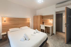 Hotels L'Oasis : photos des chambres