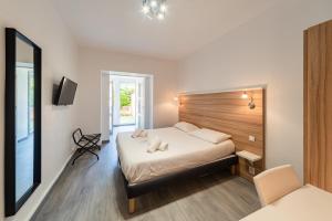 Hotels L'Oasis : photos des chambres