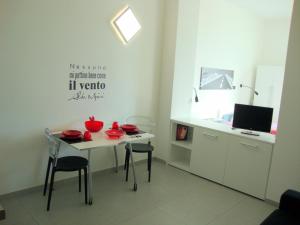 Camera Tripla Con Angolo Cottura