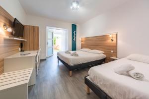 Hotels L'Oasis : photos des chambres