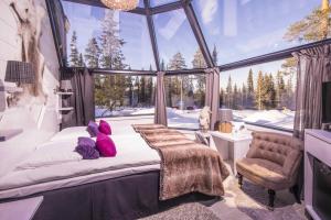 Glass Igloo room in Santa's Hotel Aurora & Igloos