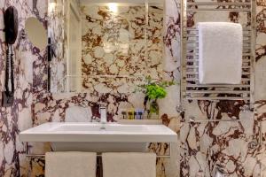 Two-Bedroom King Executive Suite room in Singer Palace Hotel