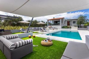 Ferienhaus Villa Ampelaki - with heated pool Kounoupidiana Griechenland