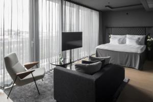 Junior Suite room in At Six