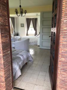 B&B / Chambres d'hotes Chambre d'hotes Romance : Chambre Triple - Vue sur Jardin