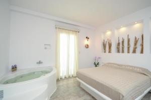 Suite With Indoor Spa Bath room in Blue Sky Summer