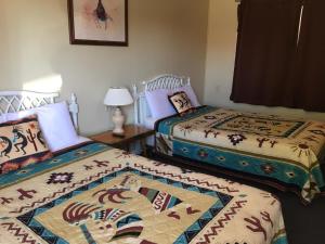 Queen Room with Two Queen Beds room in Sun -N- Sand Motel