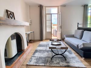 Appartements Le 52 : photos des chambres