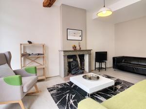 Appartements Le 52 : photos des chambres