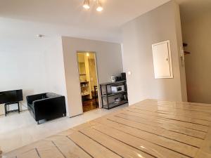 Appartements Le 52 : photos des chambres