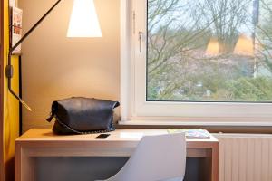 Standard Room with One Double Bed and One Single Bed room in ibis Tilburg