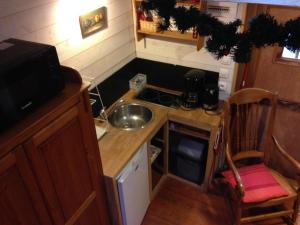 Maisons d'hotes Les Roulottes de la Baronnie : photos des chambres