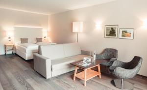 Superior Double Room with Mountain View room in Hotel Tiefenbrunn Gardensuites & Breakfast