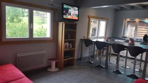 Chalets La jonquille jacuzzi et sauna : photos des chambres