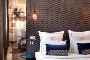 Hotels Boutique Hotel des Remparts & Spa : photos des chambres